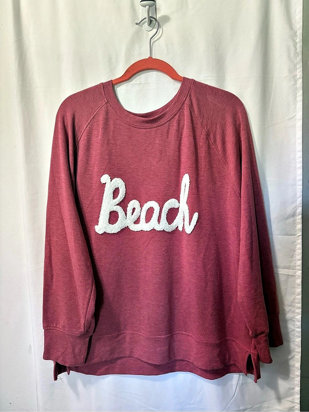 workshop Long Sleeve Beach Sweatshirt in a light burgundy color.